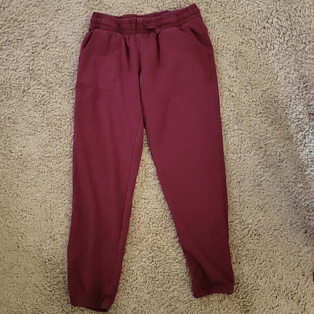 Arizona woman's xs, girls 16/18. Burgundy sweatpants with pockets.